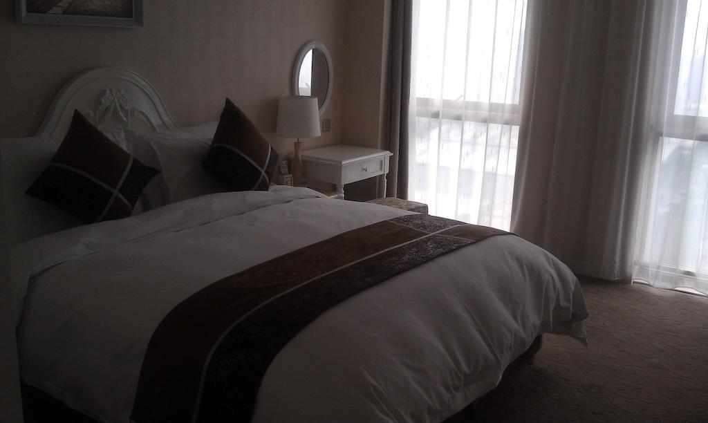 Xi'An Qu Jiang Yin Zuo Hotel Luaran gambar